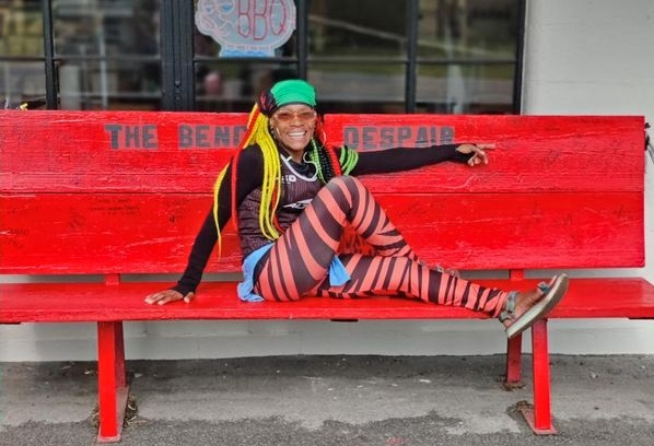 Jameelah with her signature smile and Teva running sandals.