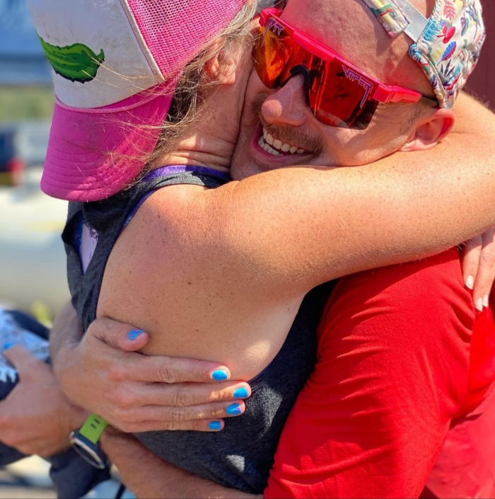Big hugs at the finish: the ultimate pacer pay-off. 