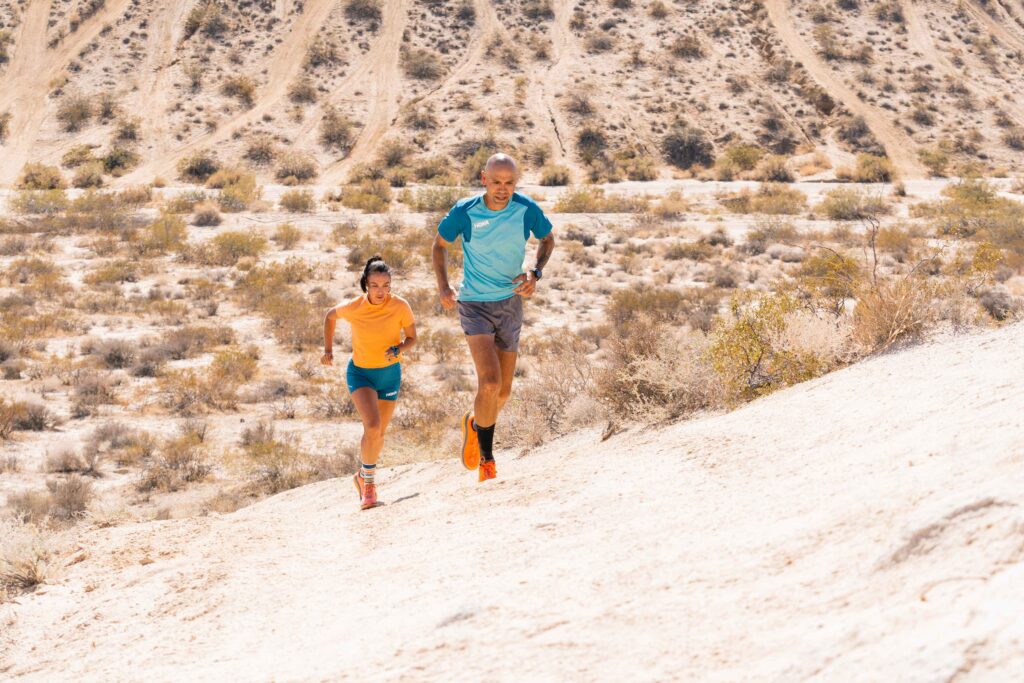 Mayra, Jerry, and miles and miles of running. .Photo courtesy of Hoka.