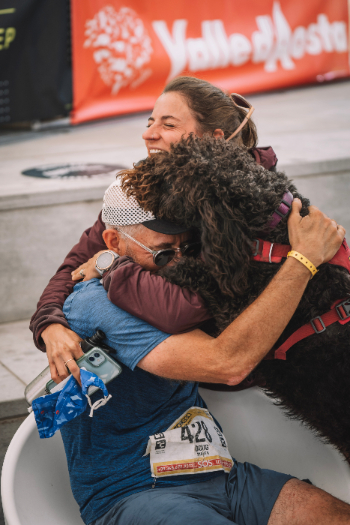 Doug, Izzy, and Hillary Gerardi celebrate the finish in Courmayeur. Photo by Sam Hill.