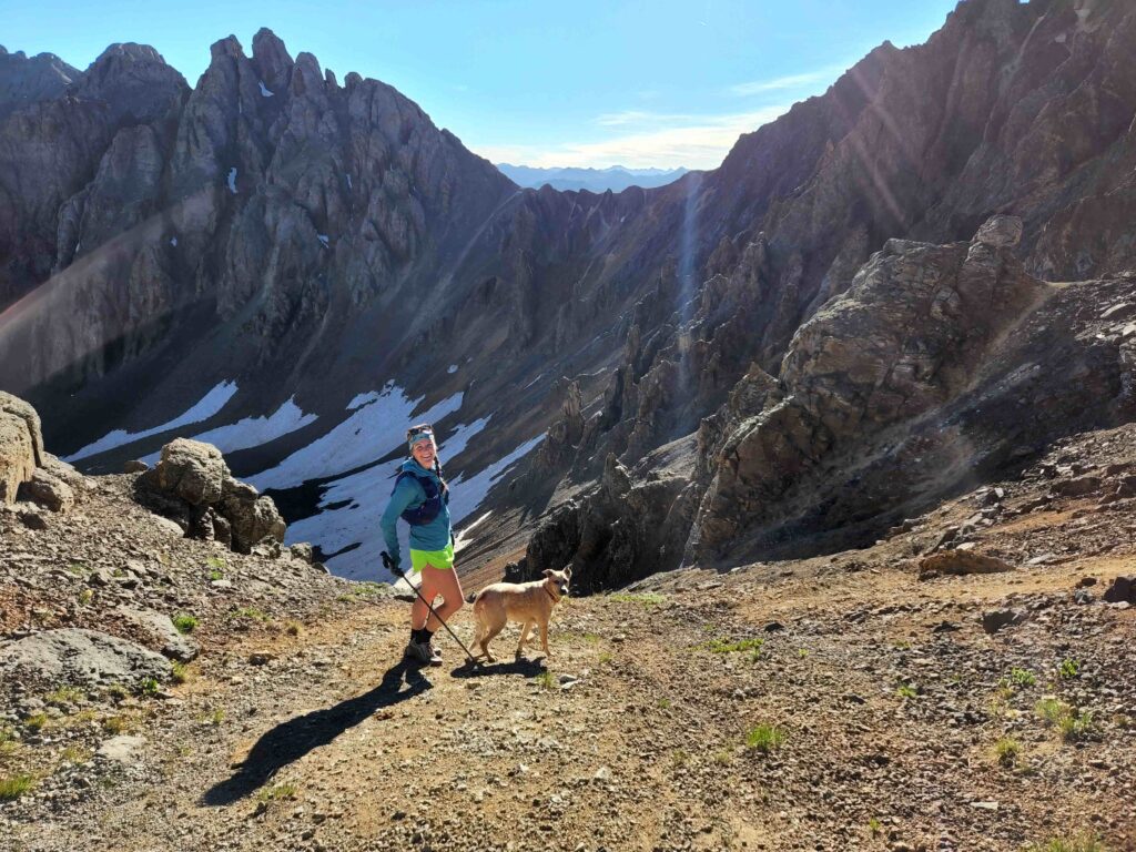 Emily and dog on Hardrock course