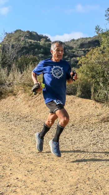 Under the sign, all things are possible 2 Ruperto running on course