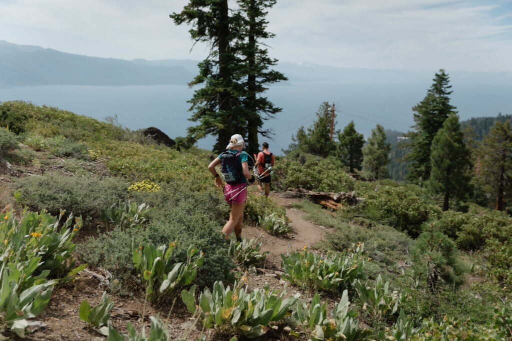 Runners gain an incredible view of Lake Tahoe before descending down the powerline climb.