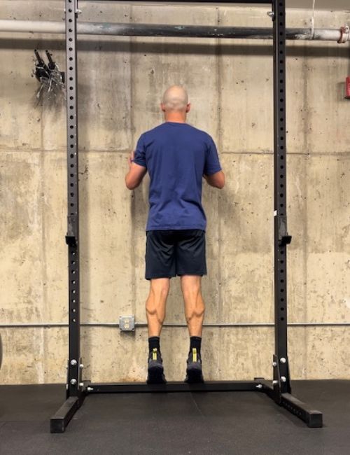 Double leg calf raise - up with two legs, down with two legs