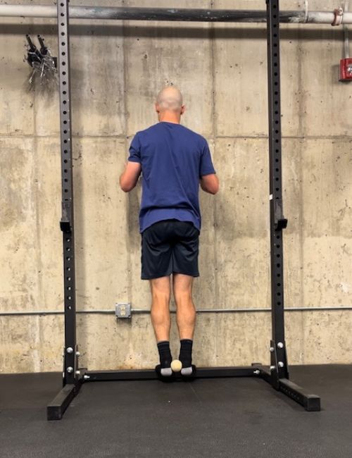 calf raise w/ ball low