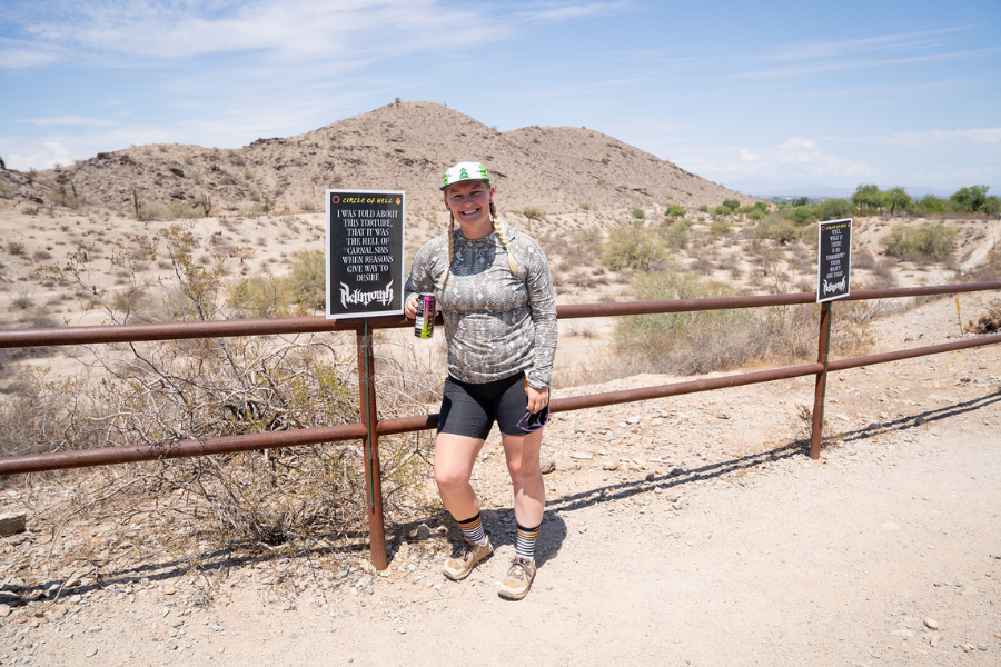 Annemarie leaning against a fence at Circle of Hell