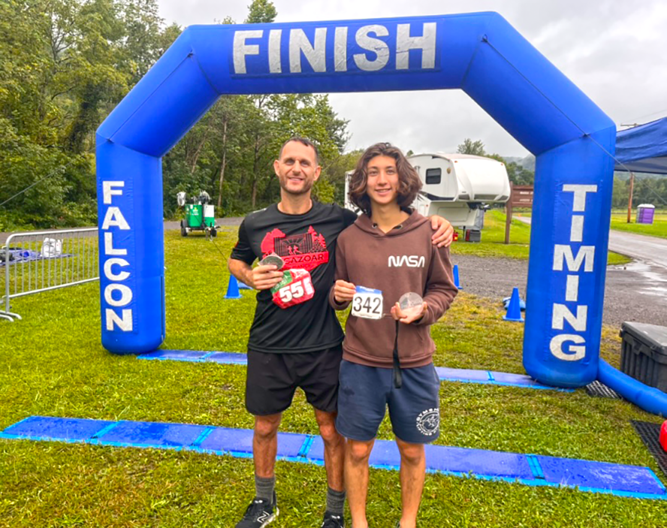 After Running 100 milers in every state, Rich Tenaglia is Inspired to Run for a Good Cause 8 Rich Tenaglia and his son Kaden after completing a race together.